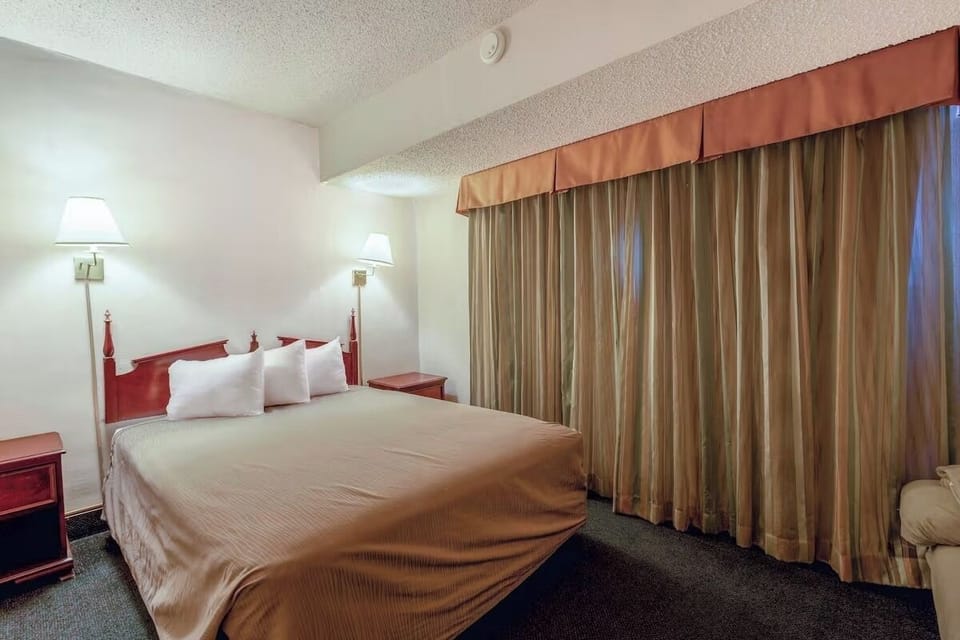 Drift off peacefully with soft lighting and blackout-style curtains.