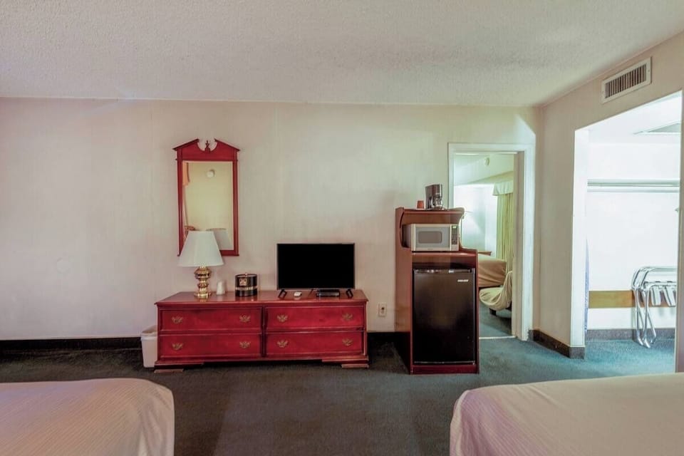 Unwind after adventures with TV, mini-fridge, and coffee setup.