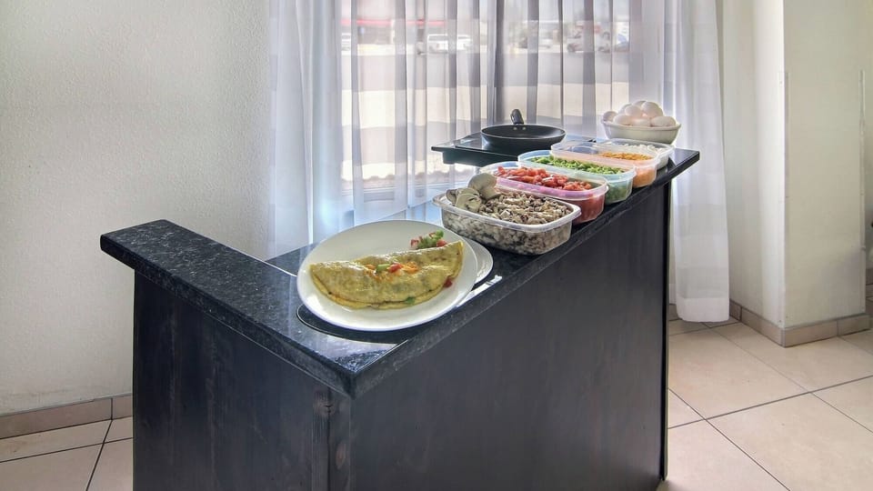Fuel your day with a satisfying breakfast spread and coffee.