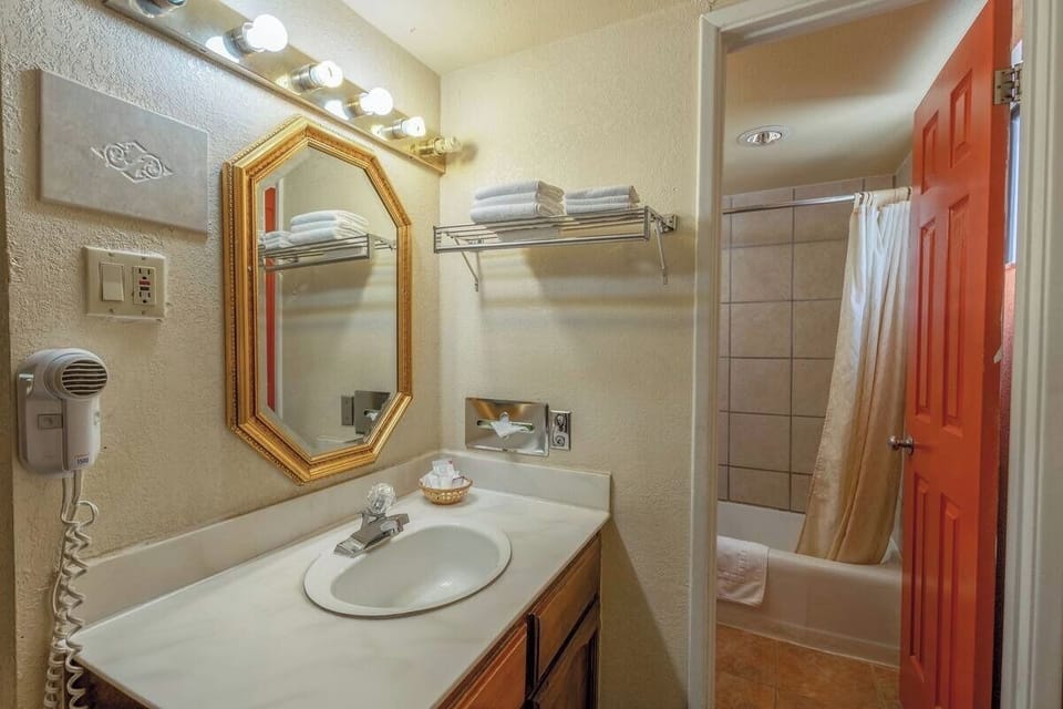 Refresh each morning with bright lighting and roomy vanity.