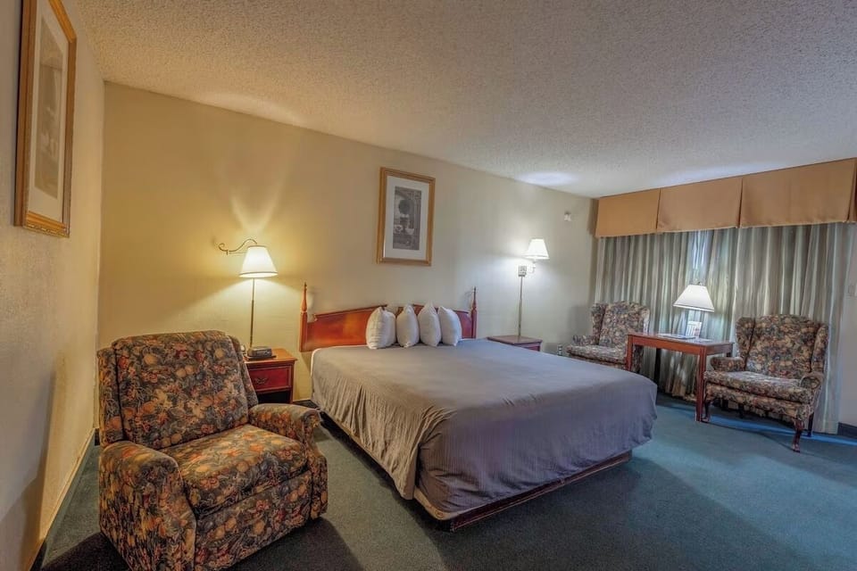 Sink into plush pillows and relax beside the softly lit window.