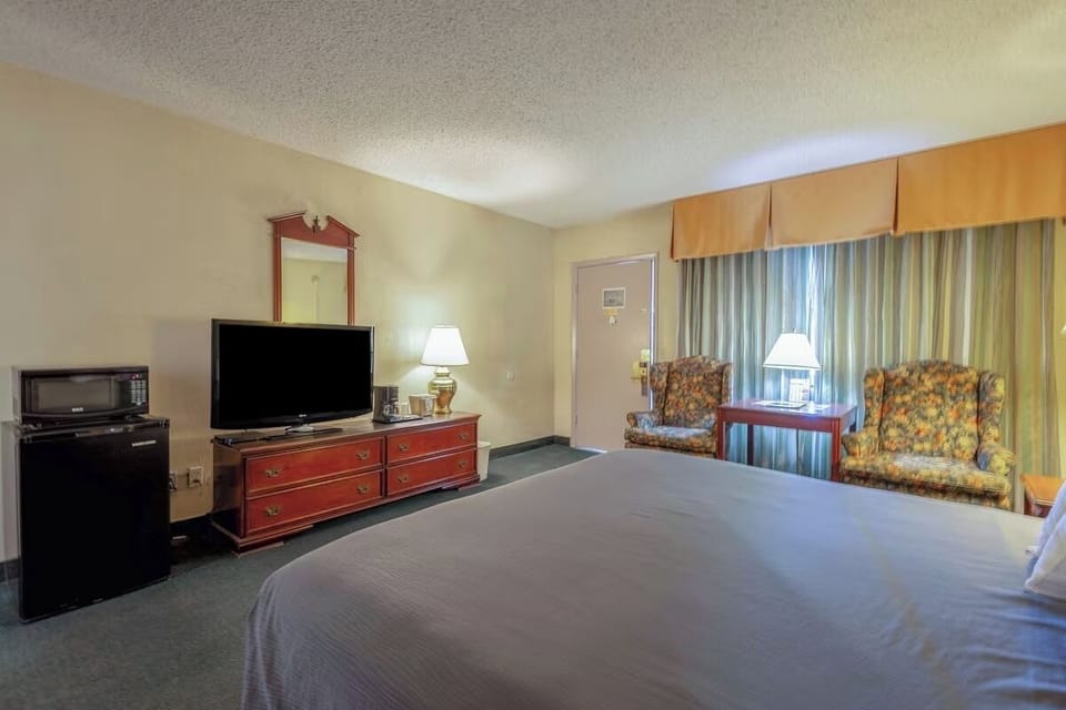 Arrive and unwind with comfortable chairs and a restful sleeping space.
