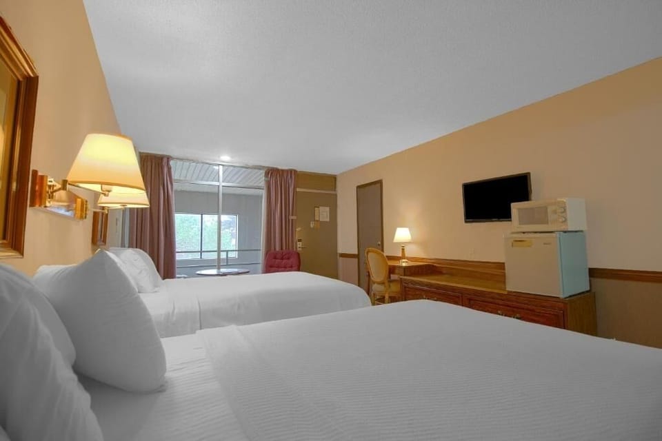 Wake up gently with natural light and restful double beds.