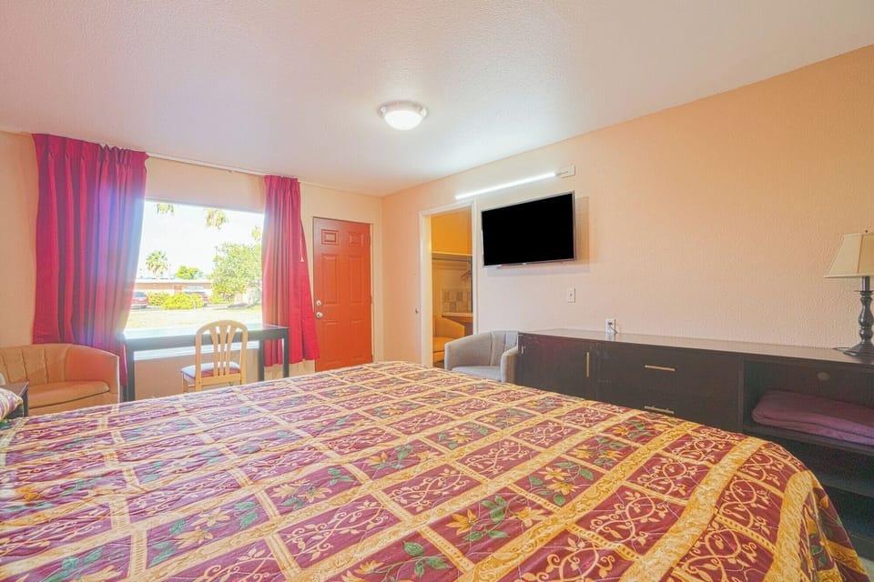 Unwind on the plush bed and enjoy easy TV nights.