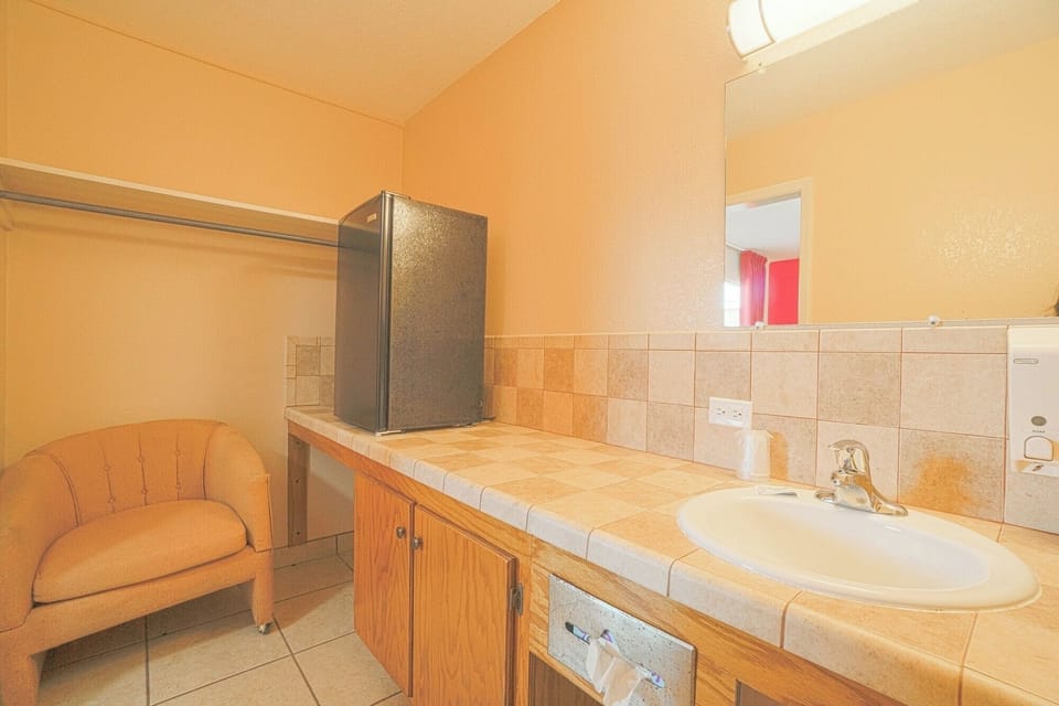 Freshen up easily with convenient in-room sink space.