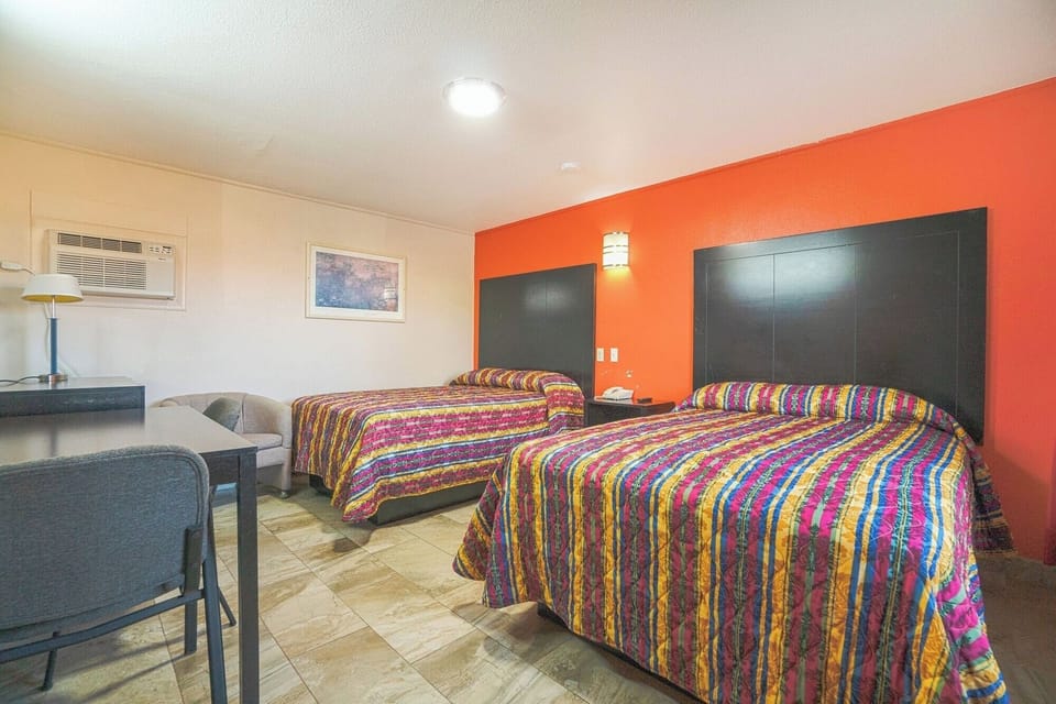 Settle in with two comfy beds and relaxed seating.