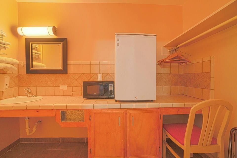 Refresh snacks and mornings with handy microwave and mini-fridge.