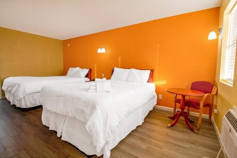 Stretch out with two plush beds and warm, sunny tones.