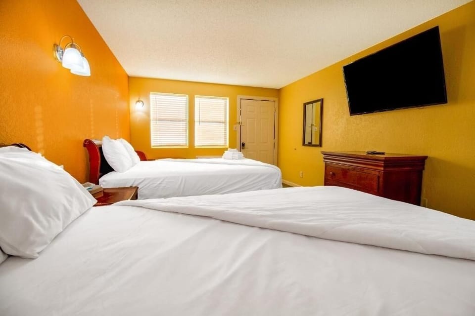Recharge in a roomy double-bed retreat with modern flooring.