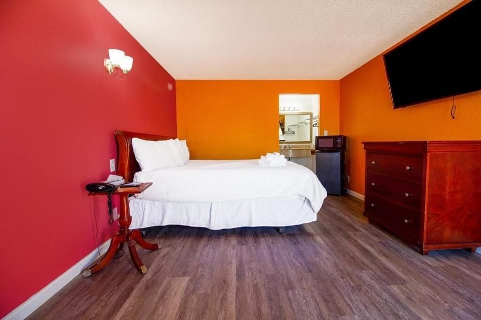 Settle in with a spacious layout, TV, and easy comfort.