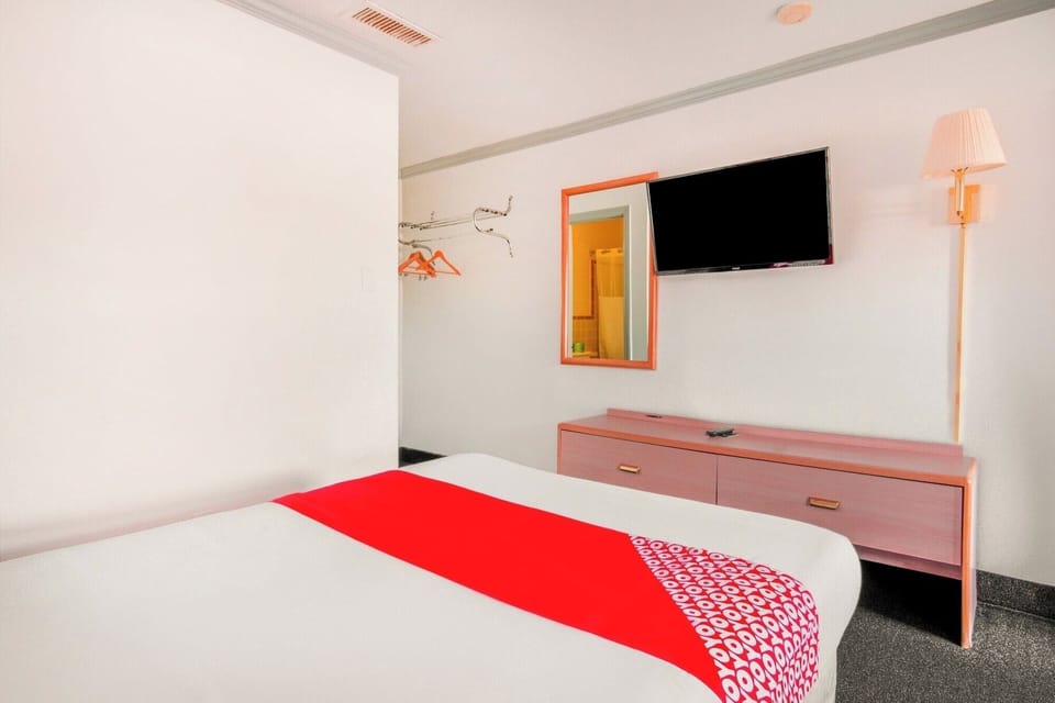 Sink into fresh bedding and relax with your favorite shows.