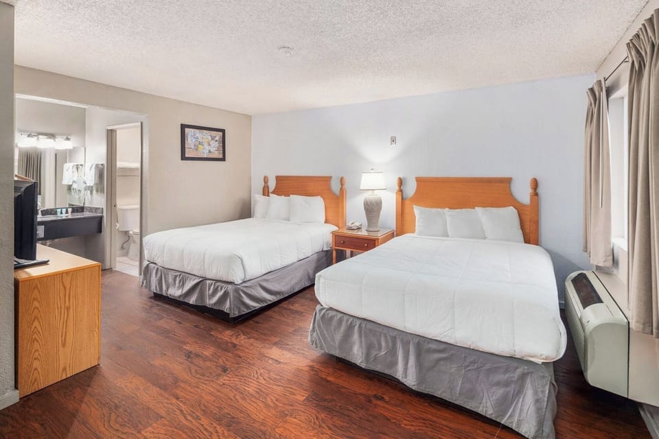 Stretch out with two cozy beds and easy bath access