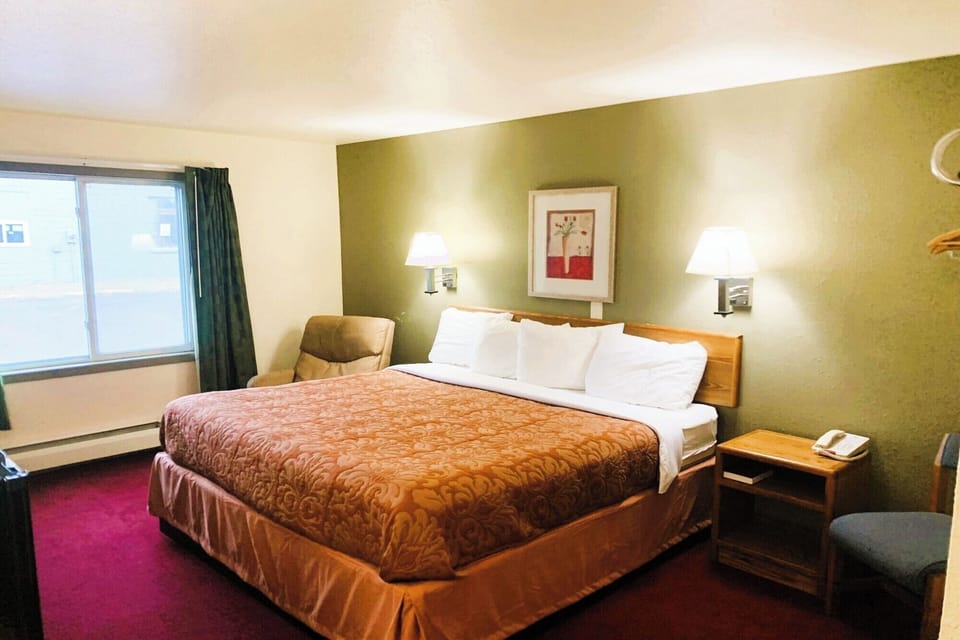Settle in and relax with warm lighting and comfy chair.
