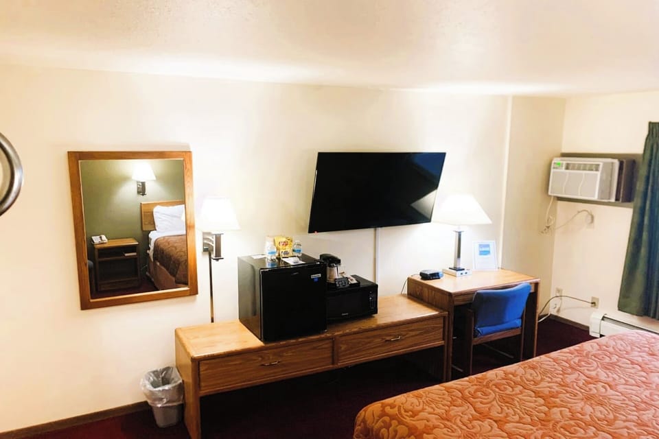 Kick back after adventures with dresser space and big TV.