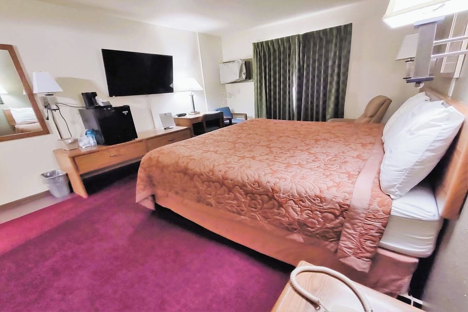Stretch out on a plush bed and enjoy late-night TV.