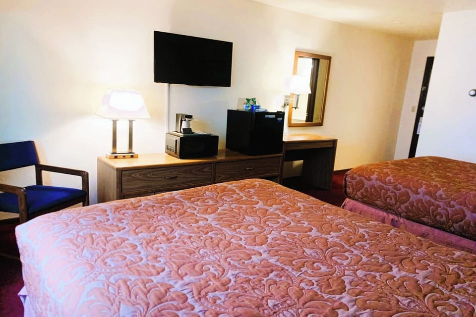 Recharge with in-room coffee, mini fridge, and easy comfort.