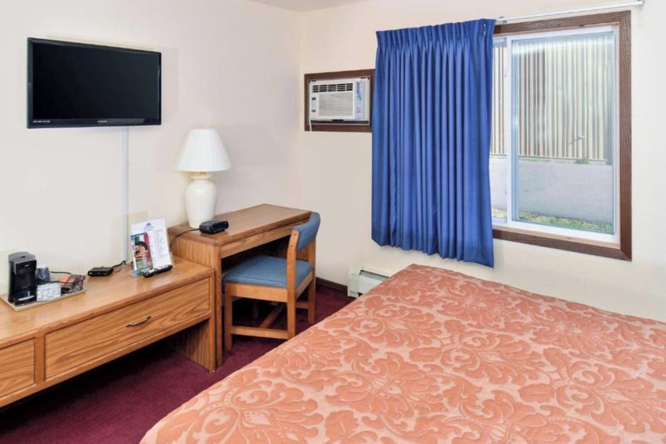 Freshen up by the window, with AC comfort and workspace.