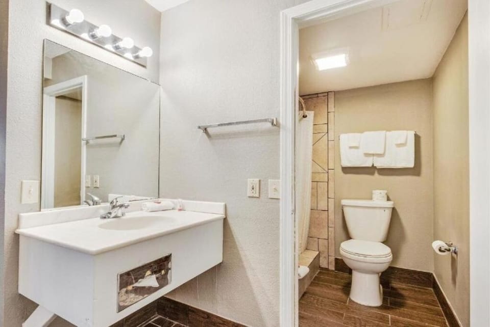 Refresh comfortably with bright lighting and clean towels ready.
