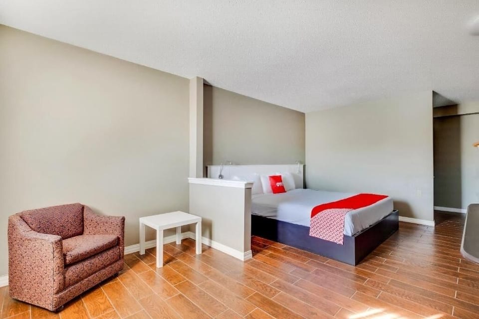 Unwind in a spacious room with cozy seating corner.