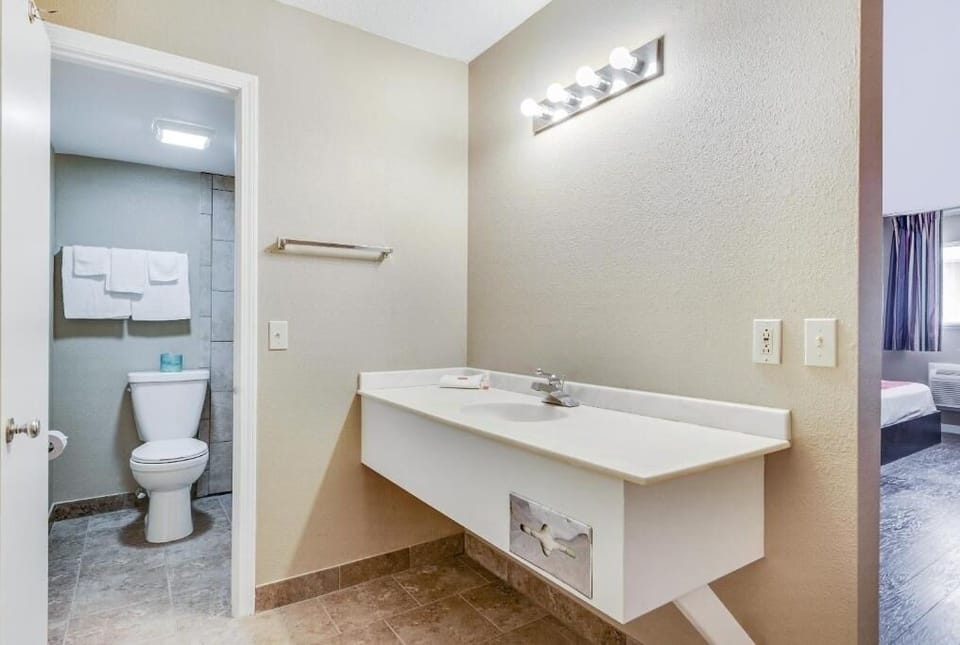 Start your day with a spacious vanity and bright mirror lights.