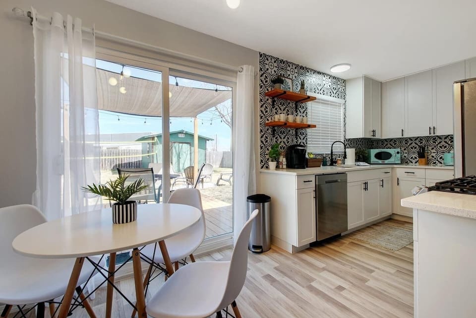 Kitchen equipped with coffee and condiments 