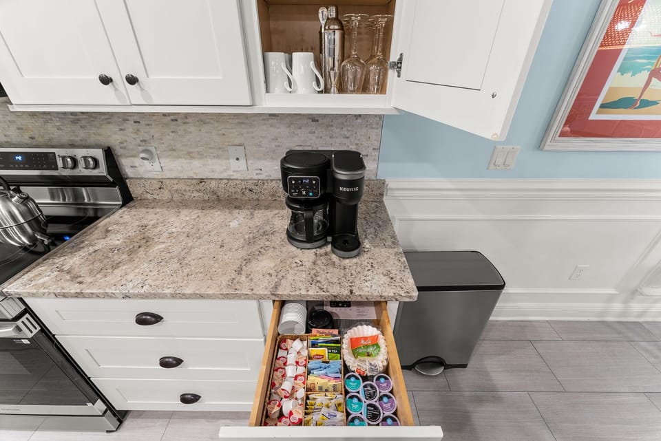Keurig pod/drip coffee station (dark, light, decaf), filter, tea, sugar, creamer