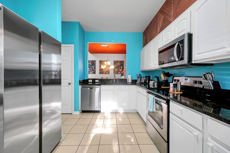 Bright kitchen with stainless appliances & coffee bar for easy family meals