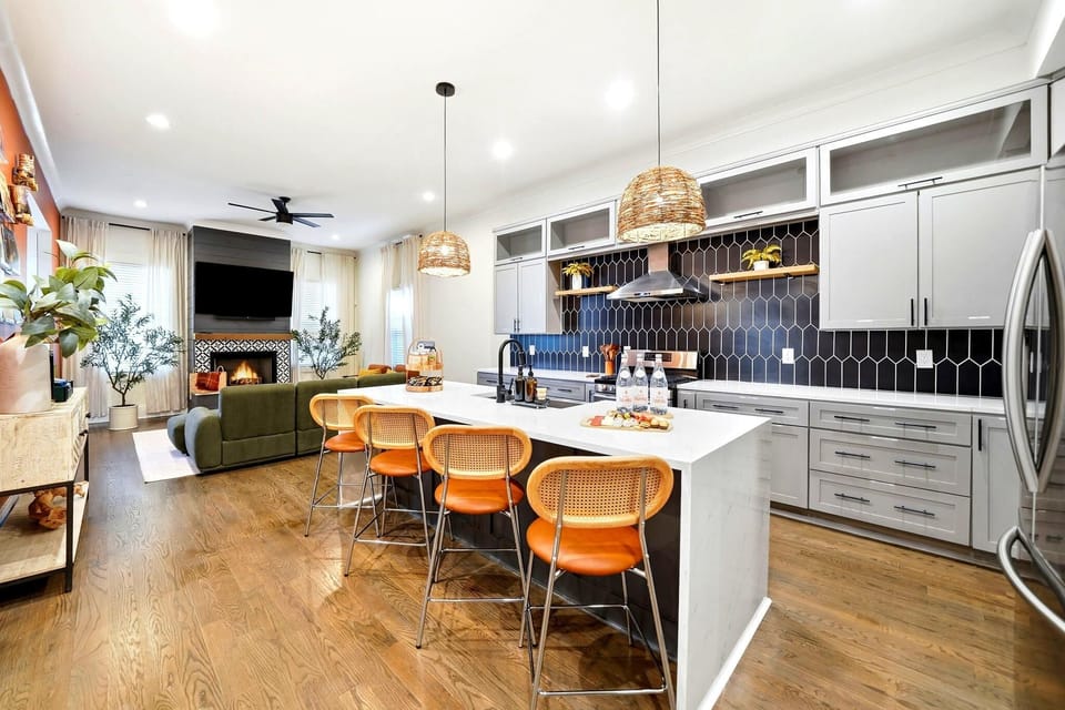 Stainless steel appliances, ample counter space, and seating for four