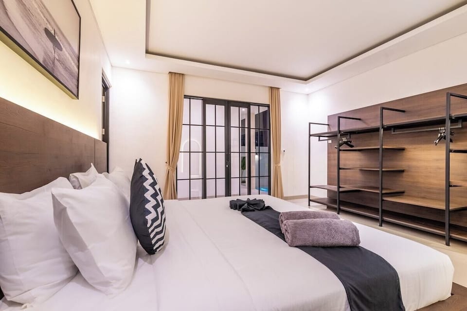 Step into serenity and comfort at Villa Bratan’s ensuite bedroom—a tranquil sanctuary blending tropical style with Bali’s calming charm. Your personal escape awaits. #Villa Bratan