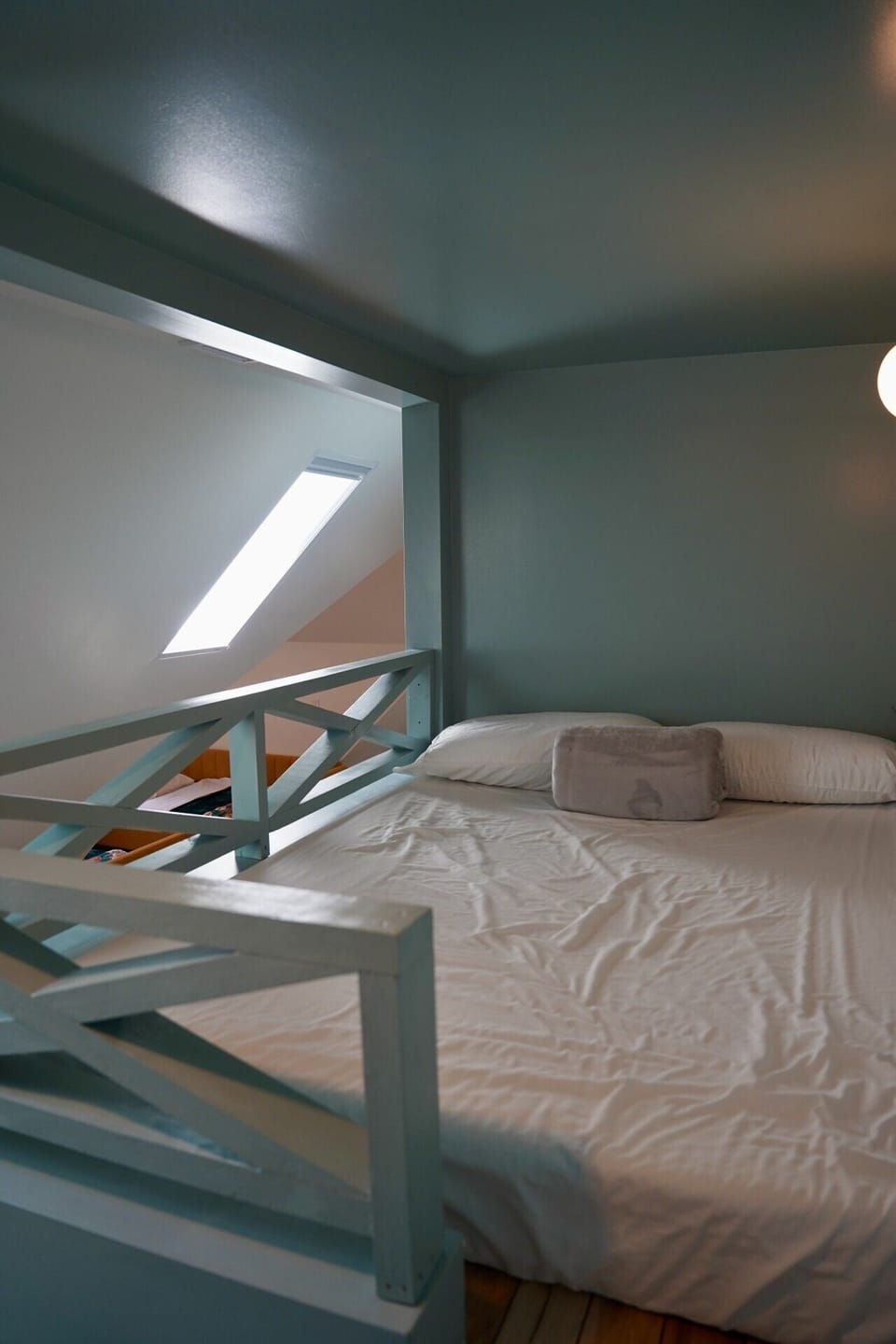 Light-filled loft nook, made for restful nights.