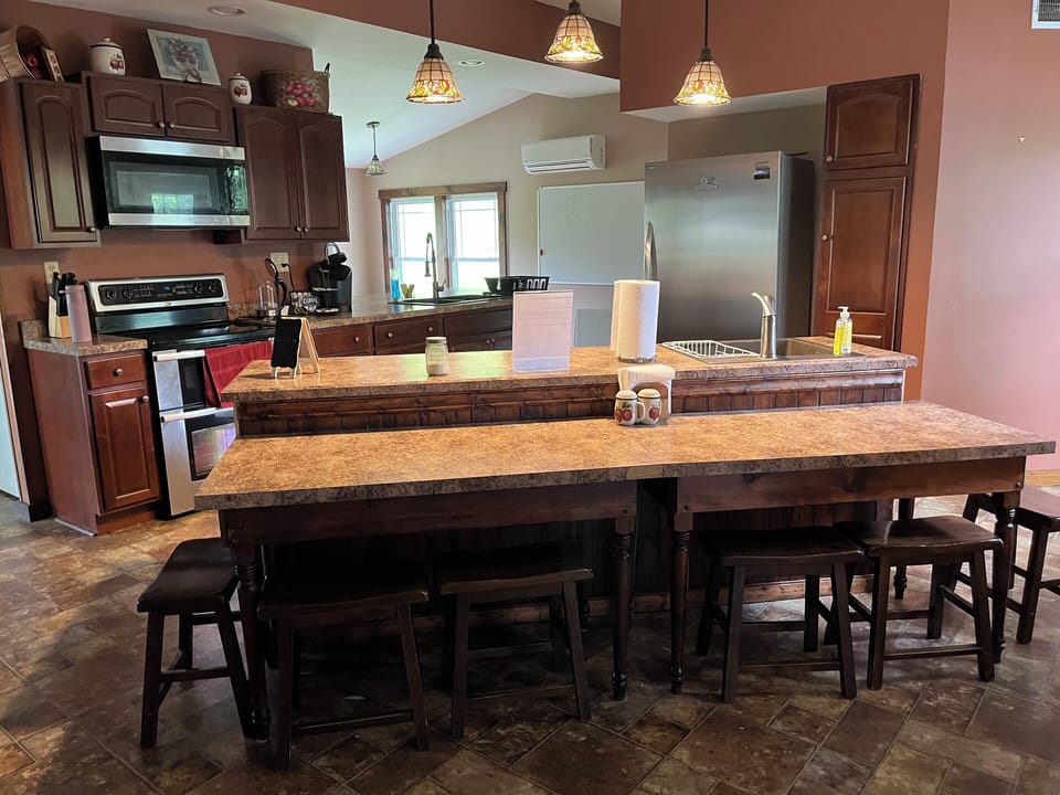Large open kitchen with bar seating