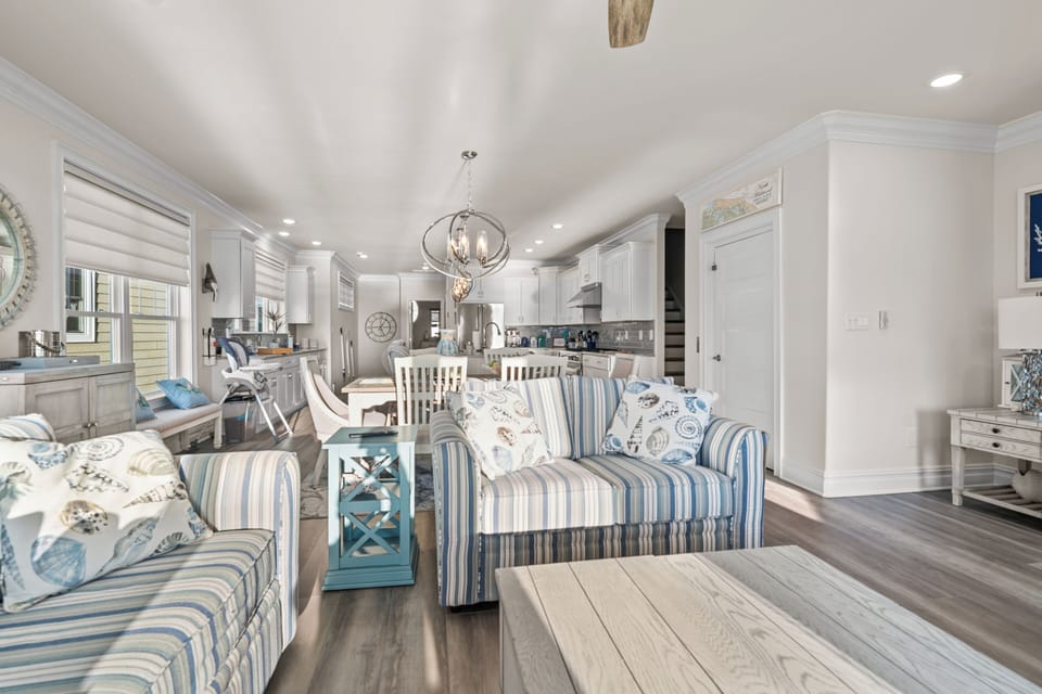 Living Room (2nd Floor) - Open-concept into dining and kitchen w/ porch