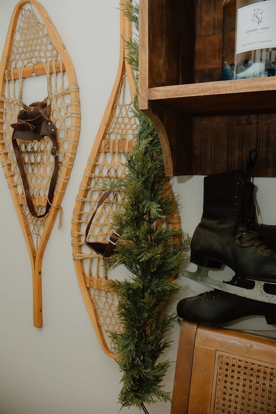 Vintage snowshoe decor and pine garland bring authentic White Mountains charm to this Pinetop vacation rental. Complimentary starter laundry pods provided for your convenience near Sunrise Ski Resort in Arizona's mountain country.