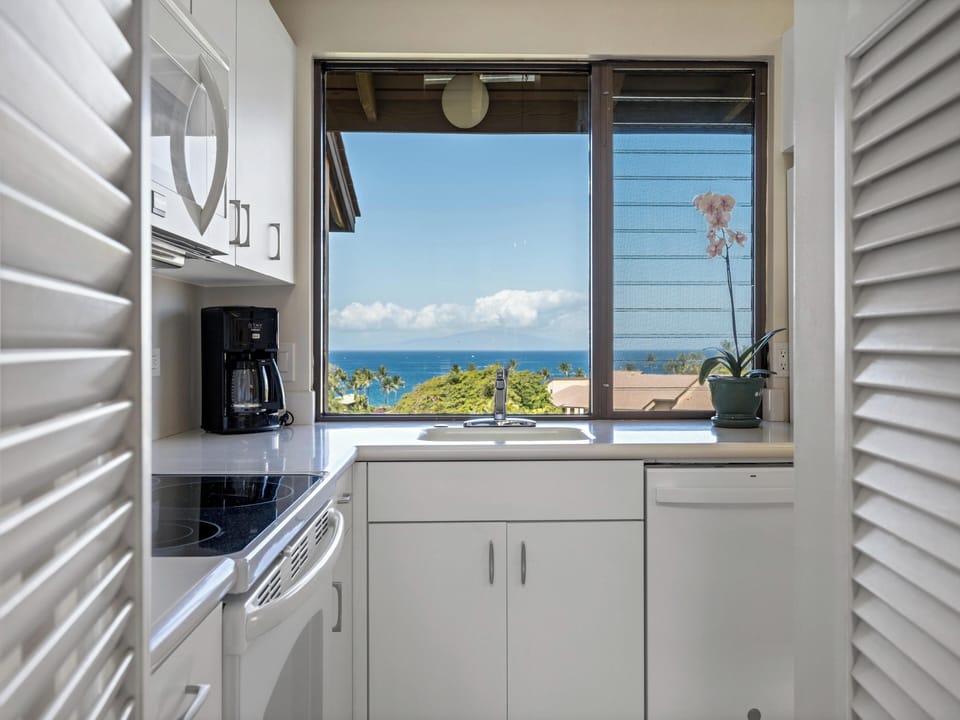 Appliances: Features an oven, microwave, dishwasher, a side-by-side refrigerator with on-demand ice and water, and a highly praised Vitamix blender.