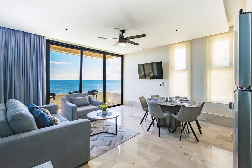 Bright living and dining area with stunning ocean views
