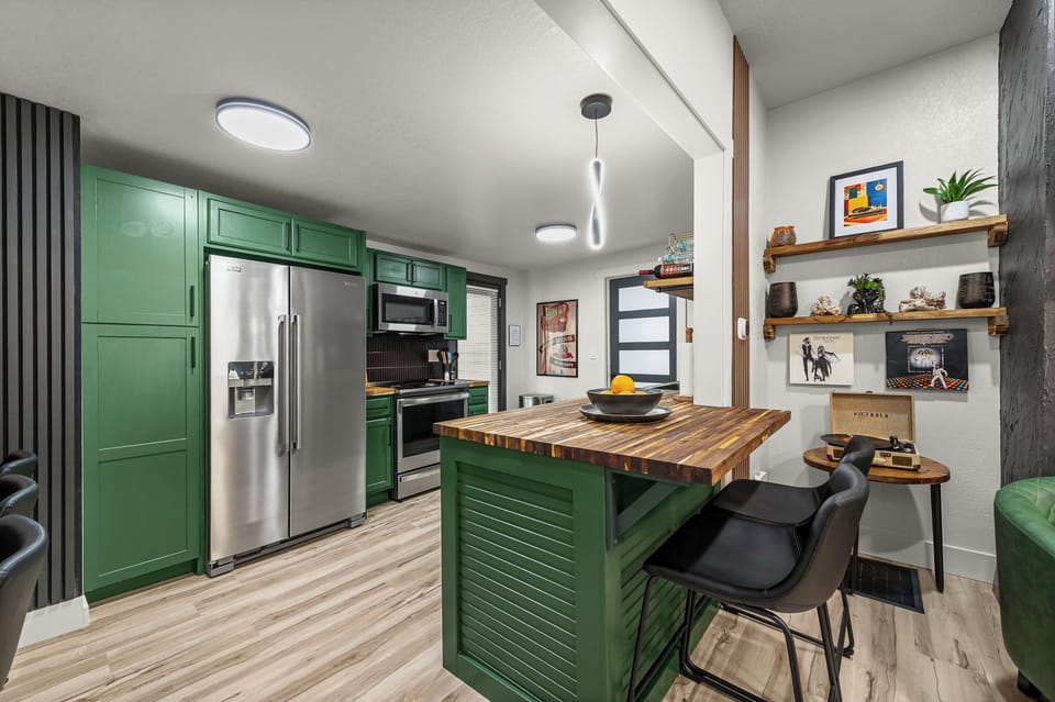 Gather in a kitchen that blends modern style with charm with all the necessities