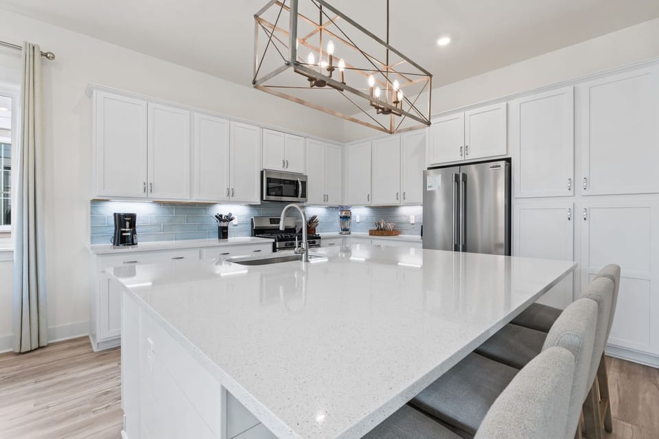 It's expansive surface offers plenty of room for meal prep, casual dining, or gathering with friends over drinks and appetizers.