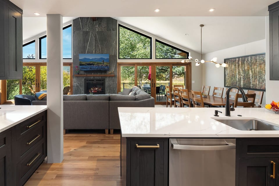 Living area leads into the dining area and kitchen