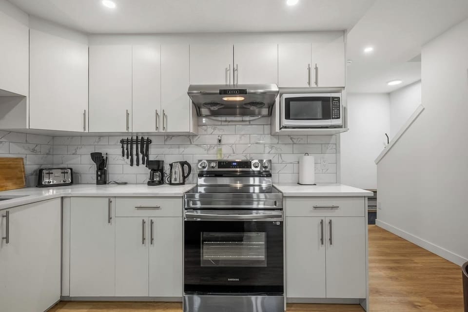 Well-appointed kitchen featuring stainless steel appliances and ample counter space