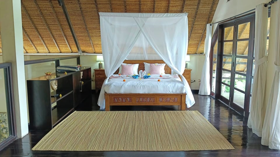 Bedroom 4 with a king bed, located upstairs