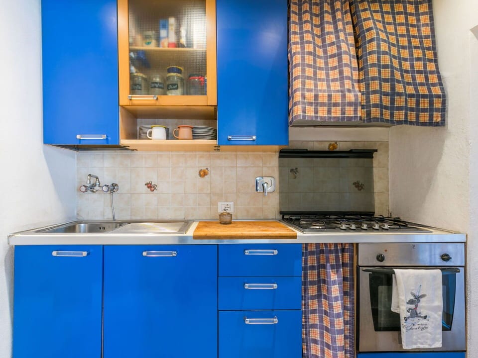 Blue, Kitchen, Major Appliance, Kitchen Appliance, Interior Design, Flooring, Countertop, Kitchen Stove, Stove, Cabinetry