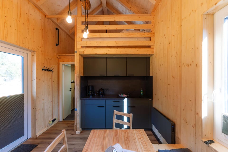 Living area with kitchen and dining area