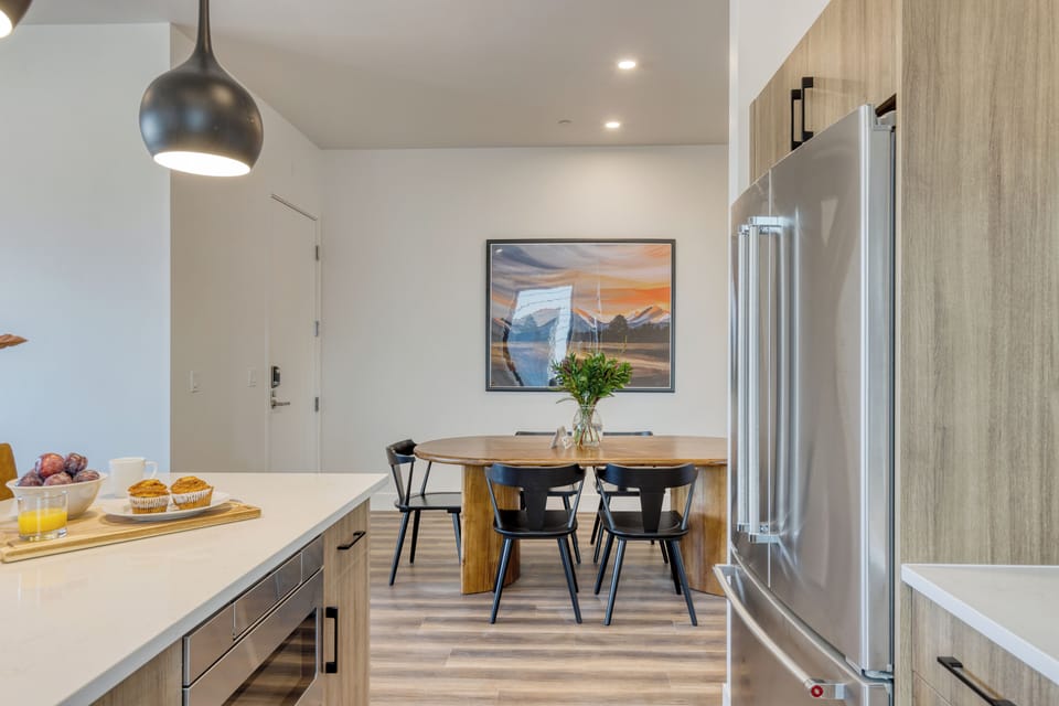 Modern kitchen with island seating and sleek finishes.