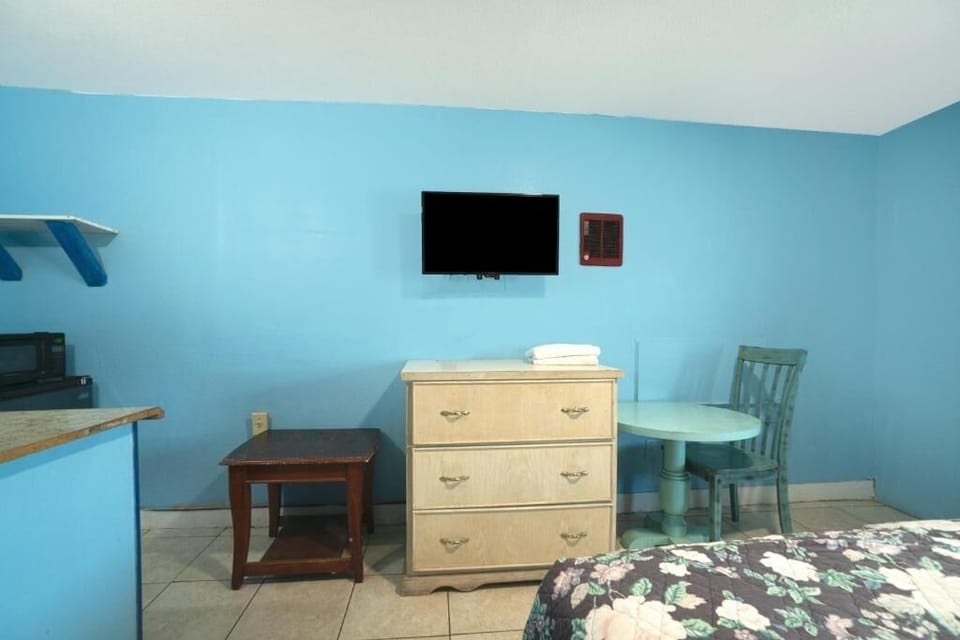 Kick back with in-room TV and easy, laid-back seating.