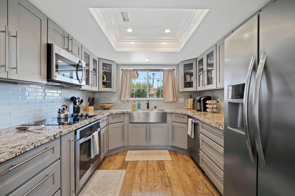 Bright, open kitchen stocked with all the essentials for your stay 