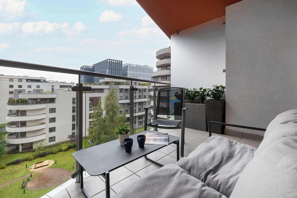 The balcony's peaceful ambiance is ideal for unwinding.