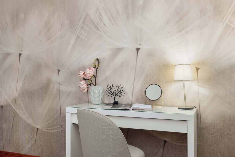 Enjoy the simplicity and comfort of the bedroom's modern design.