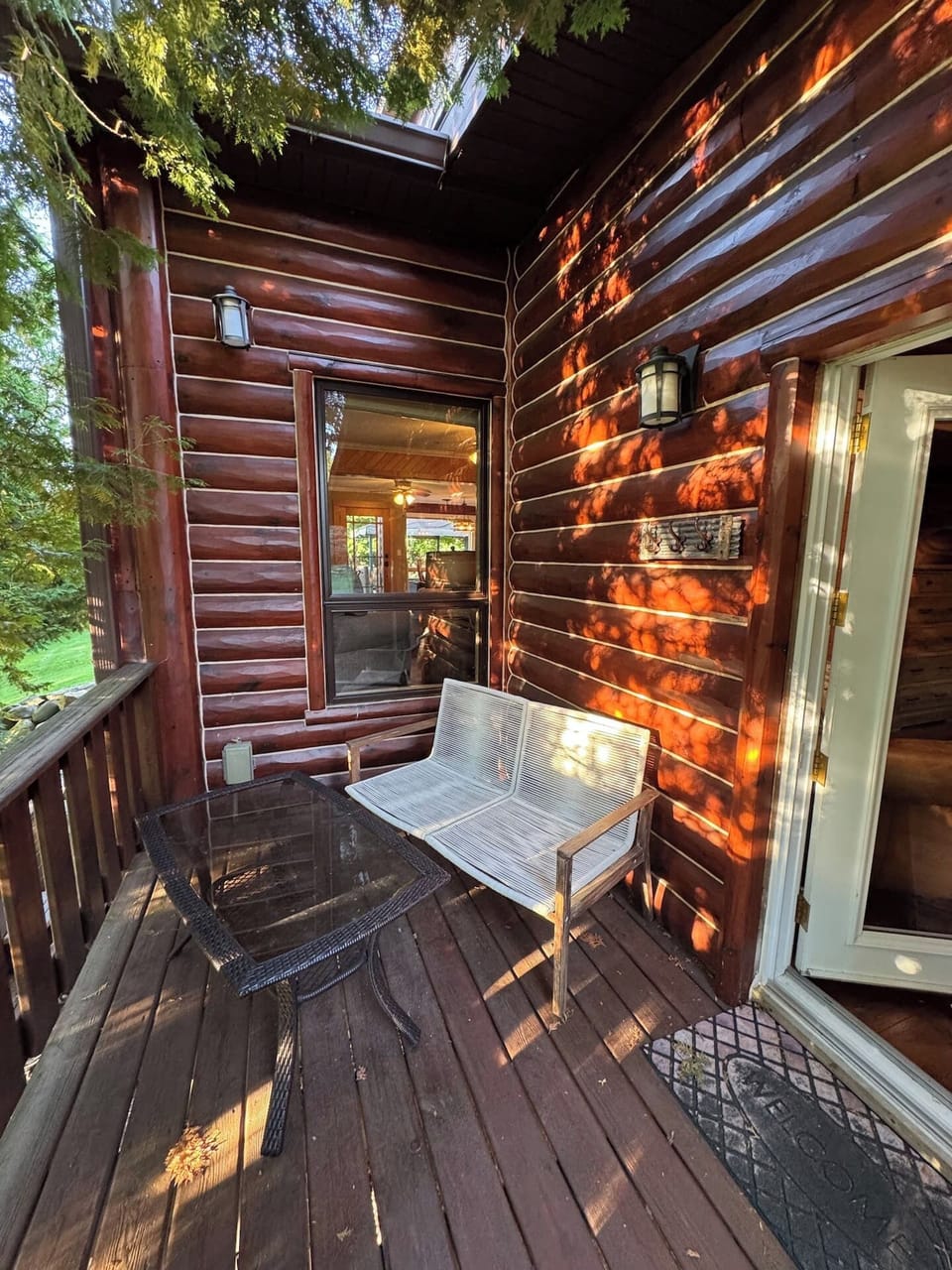 Master bedroom on main level with attached bathroom and walkout to back deck