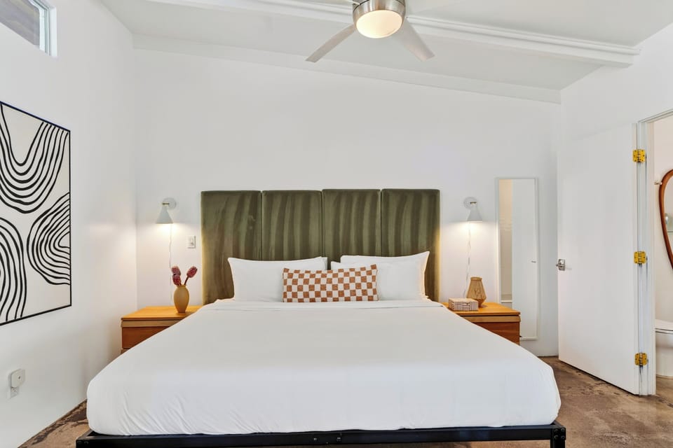 Plush king-sized bed.