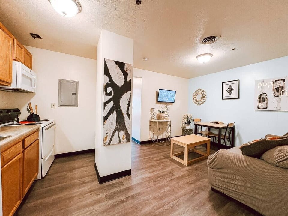 Modern shared space w/ comfy seating & a streaming-ready TV to unwind after a long day.